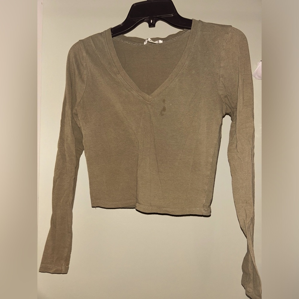 Brand is Bozzolo, size is a medium and color is kind of an olive green
